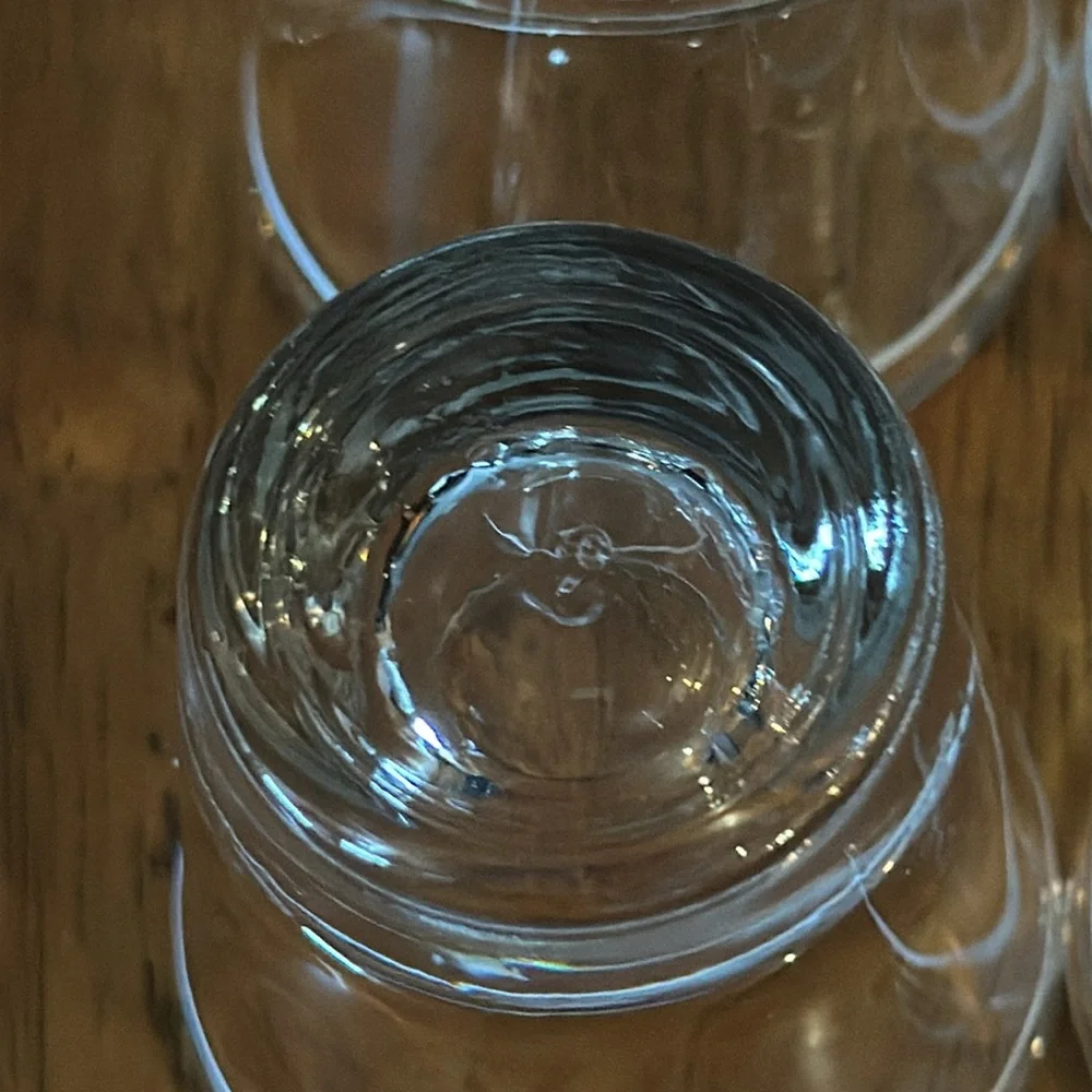 Anchor Hocking shot glasses. Clear with white stripe. Originally from Starbucks